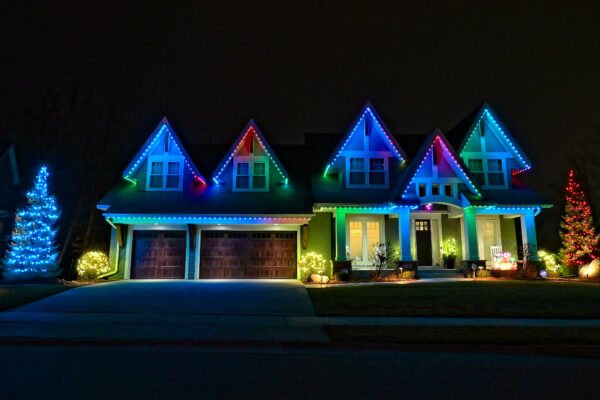 Trimlight of Long Island lighting permanent outdoor programmable lighting system installed on a house.